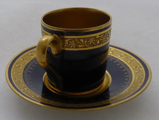 Limoges porcelain cup and saucer 