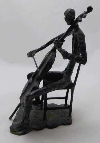 Bronze sculpture of a cello player