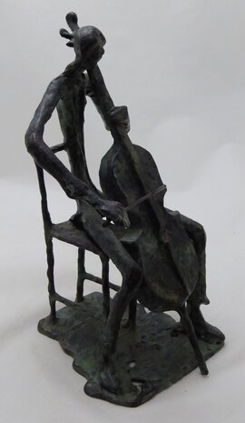 Bronze sculpture of a cello player