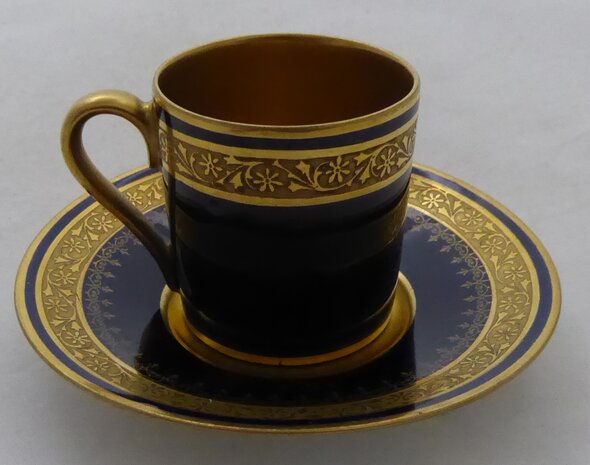 Limoges porcelain cup and saucer 