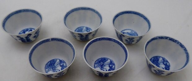 Antique sake cups with geisha ladies